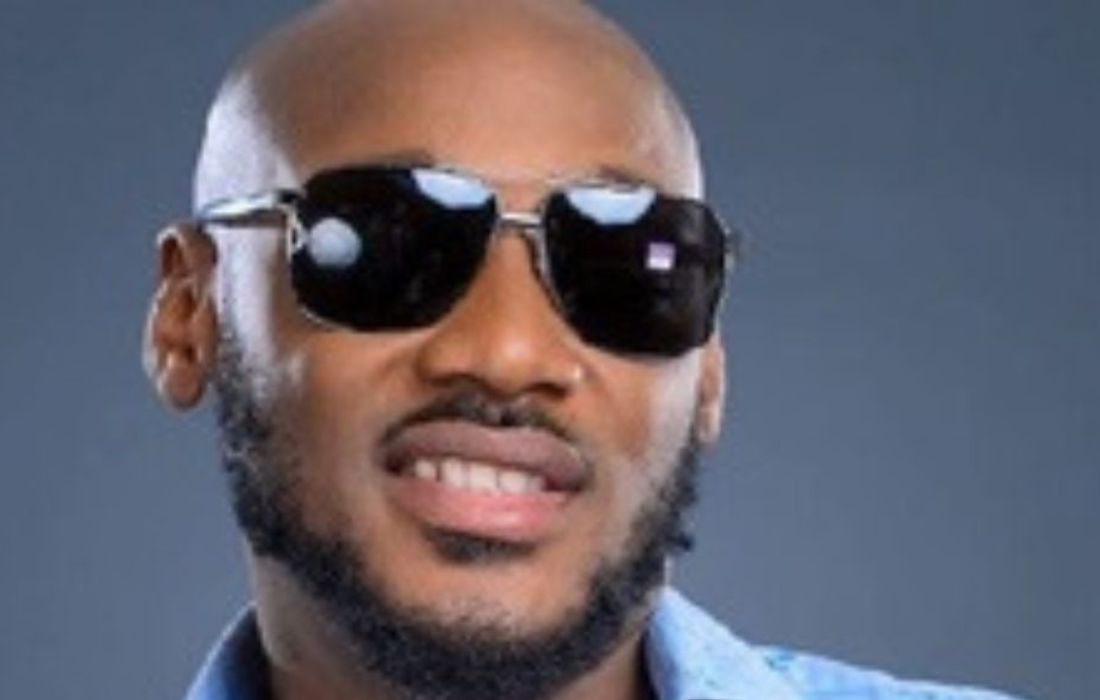 innocent idibia in blue shirt