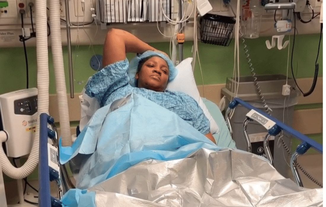 Omotola Jalade in hospital bed