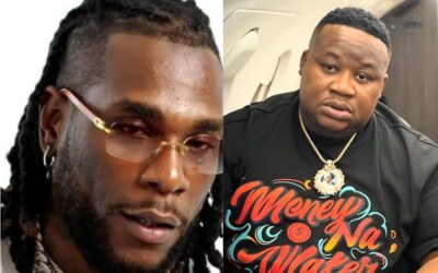 slide of burna boy and cubana chief priest